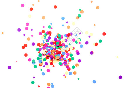 彩色圆形纸屑洒在白色上背景图片