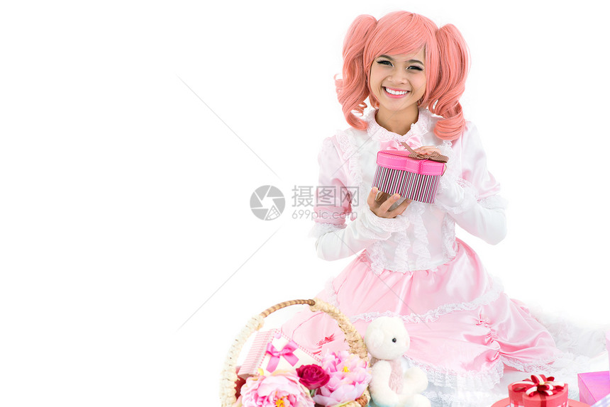 粉红开幕礼物中一个快乐的生日女图片