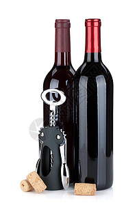 两个红葡萄酒瓶软木瓶和corkscrew孤图片