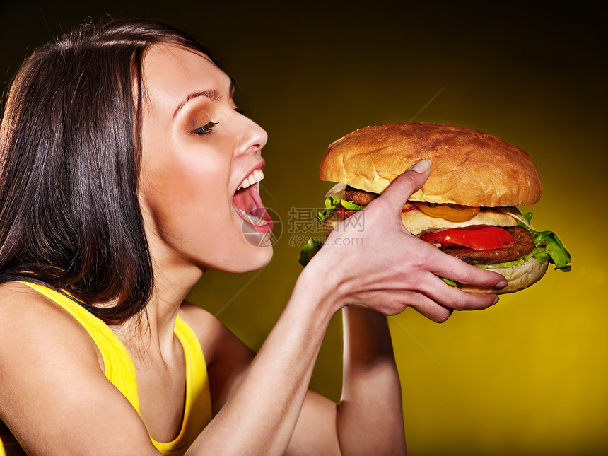 吃汉堡的苗条女人图片