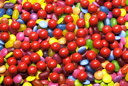 多色糖果和糖果的明亮背景摘要图片