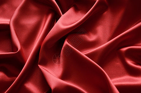 红色丝绸或缎面背景图片