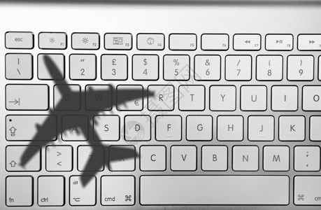 电脑键盘上的飞机影子图片