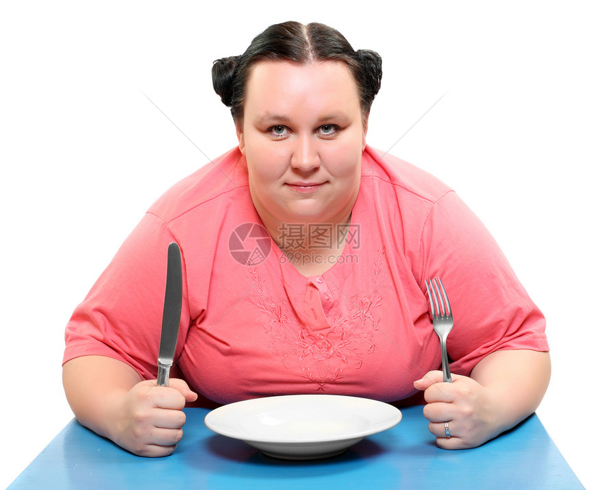 饥饿的胖女人空着盘子关于饮食主图片