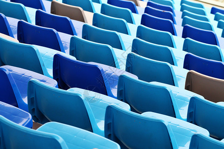 体育场内的蓝色塑料座椅图片