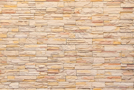 现代风格设计装饰不均匀裂开石质墙壁表面与水泥的布局图片