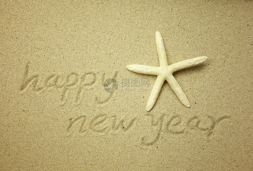 沙滩上的新年贺词图片
