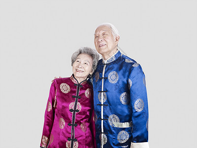 一部高龄夫妇传统服装背景图片
