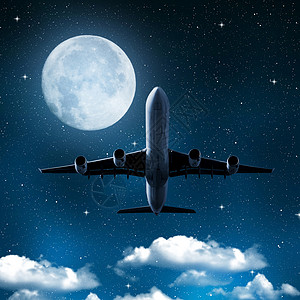 在夜空的飞机与月亮图片