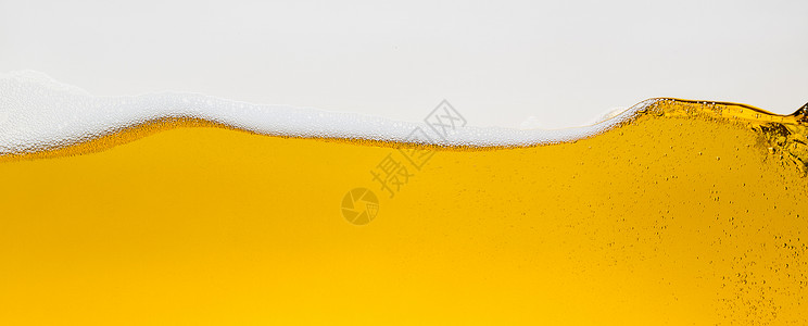 啤酒泡沫波啤酒杯玻璃泡沫王冠喷洒酒精图片