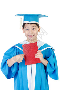 带着红书幼儿园毕业制服的亚裔孩子背景图片