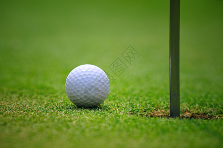 高尔夫球和孔图片