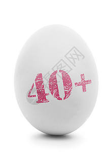 白色鸡蛋与粉红色邮票40隔离在白色图片