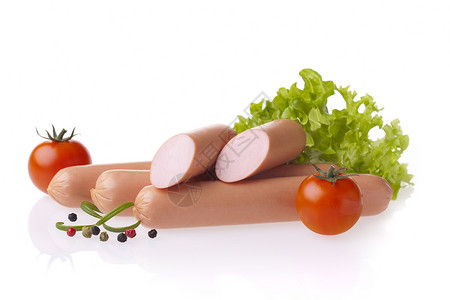 新鲜的油热狗香肠生菜和西红柿肉类成分以白色图片
