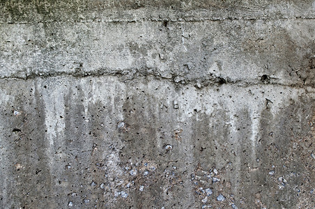 灰色水泥墙有无数裂缝和裂缝图片