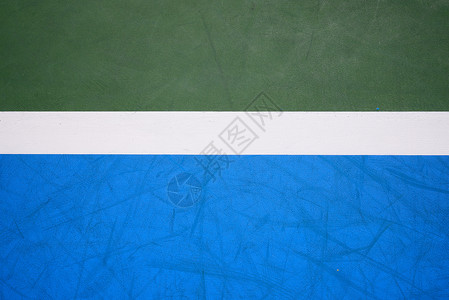 网球场表面蓝色和绿色背景图片