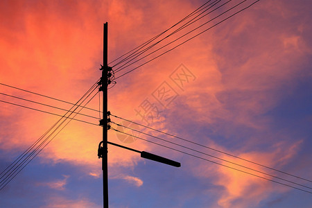 泰国的日落和电线杆图片