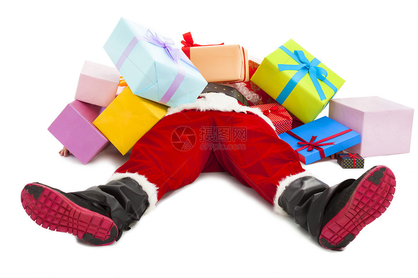 圣诞老人太累了不能躺在地板上白色背景图片