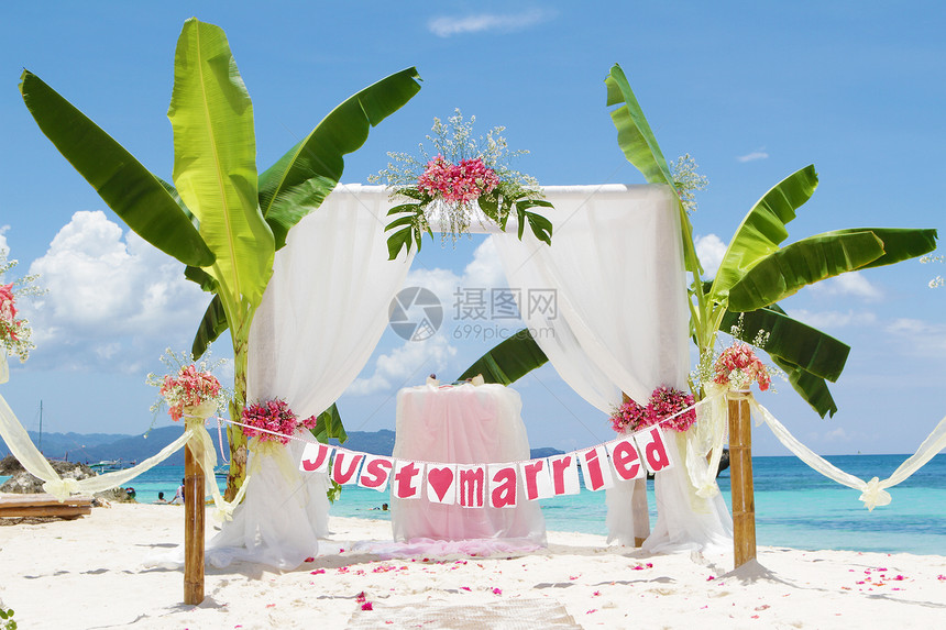 装饰沙滩花朵热带婚礼仪的布图片