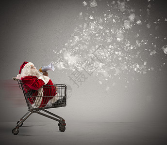 快速圣诞老人在购物车里通过图片