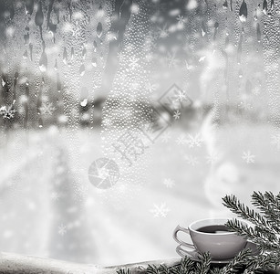 一杯热茶和冬天的风景图片
