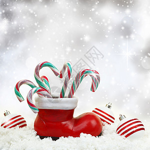 圣诞糖果甘蔗在雪图片