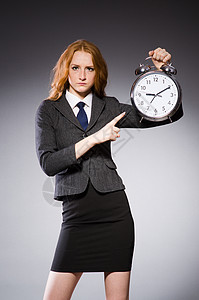 时钟迟到的女商人图片