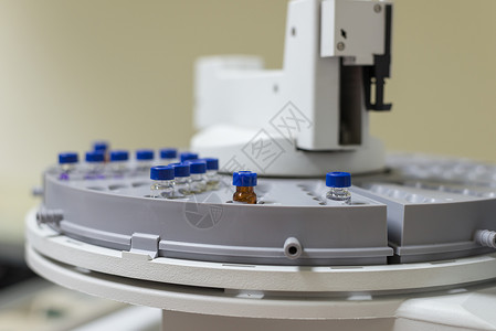 气相色谱仪化学实验室在自动扫描器托盘中背景