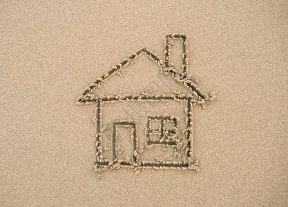 画在沙滩上的房子图片