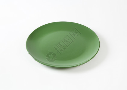 每日使用绿色餐盘的背景图片