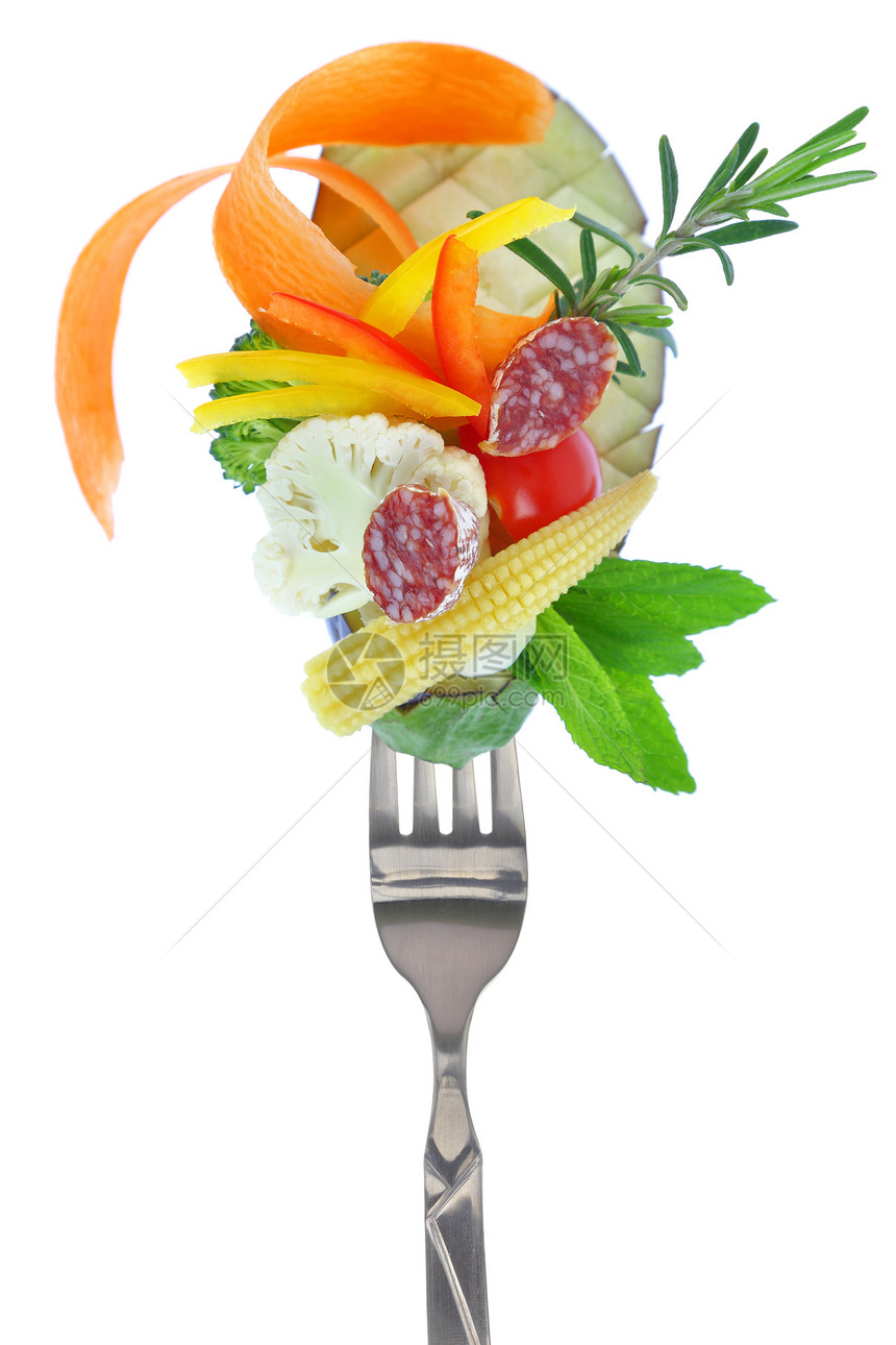 新鲜花多彩蔬菜和叉口的腊图片