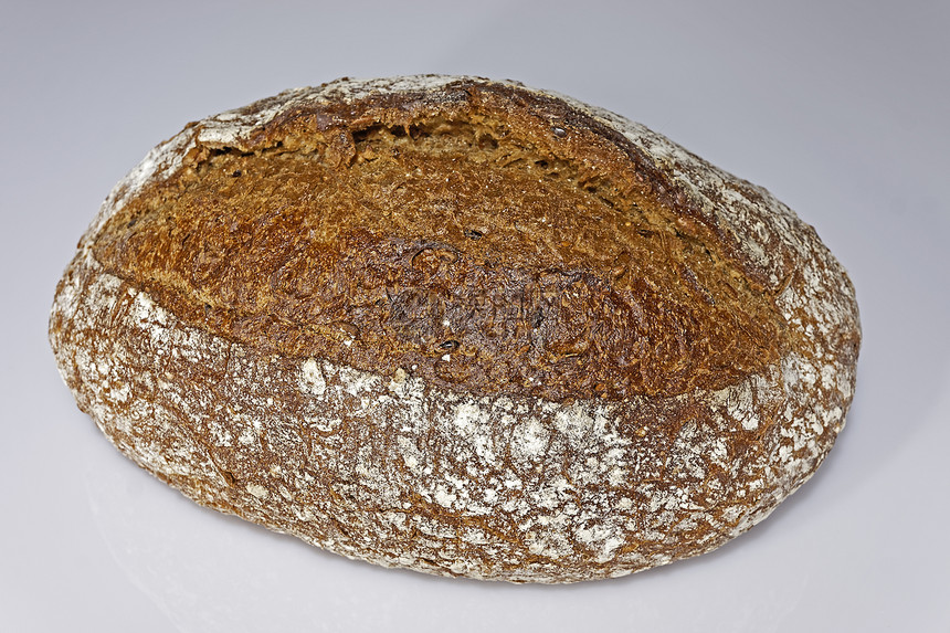 新鲜的面包小麦粉水黑麦粉葵花籽酵母亚麻籽燕麦芽粉芝麻油盐小麦胚芽糖和烘焙酵母的配方来自1925年左右图片