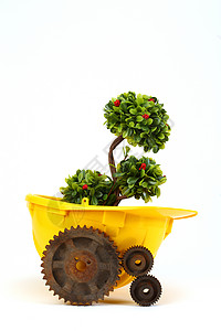 黄盔绿植生锈齿轮白环保产业理念背景图片