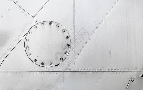 白银金属背景金属纹理和螺栓旧平面的层图片