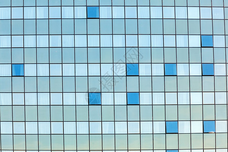 现代建筑上开窗的玻璃幕墙图片