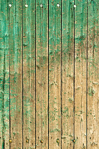 旧的风化的木板部分覆图片