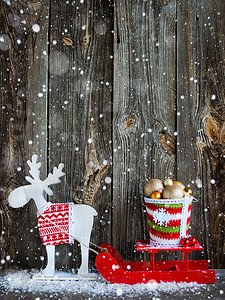 祝贺的木制背景的圣诞装饰图片