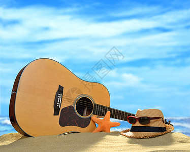 夏季沙滩上的声响吉他蓝图片