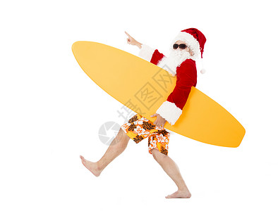 圣诞快乐圣诞老人拿着冲浪图片