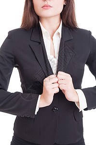 匿名商业妇女调整西装夹克图片