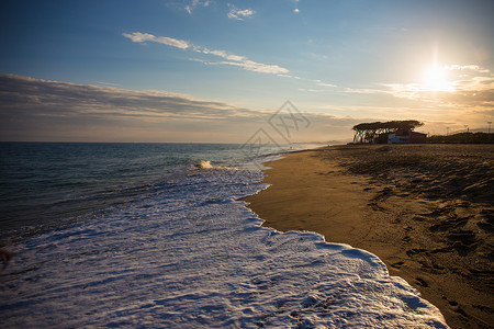 日落海滩背景与戈登沙海和天空图片