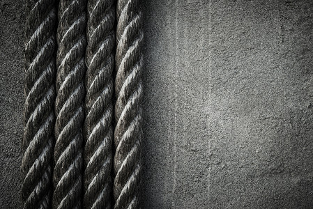 黑色和白色的四根绳索背景背景图片