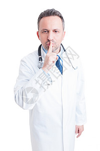 医生或医务人员用手指在嘴唇上做一个秘密手势图片