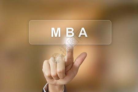 在模糊背景上推动MBA或工商管理硕士的手动图片
