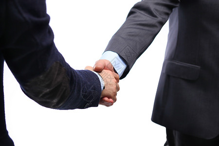 生意上握手两个商人在办公室里和对方握手了图片