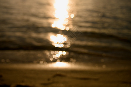 沙滩的日落反射图象模糊不清当视野完全清图片