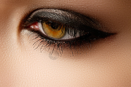 眼妆美丽的眼睛复古风格化妆假日化妆细节眼线笔化妆品和化妆时尚面貌的图片