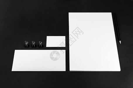 黑背景空白文具和公司身份模板照片图片