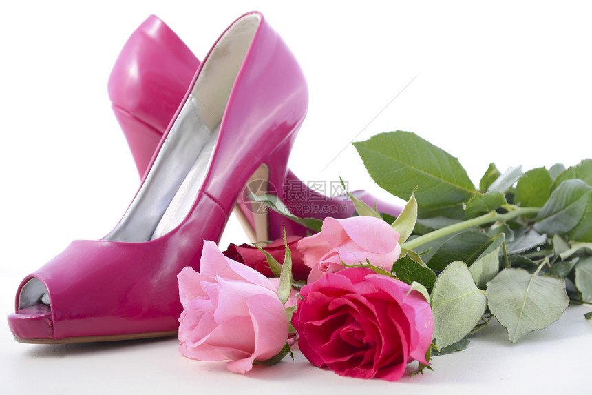 3月8日国际妇女节时粉红女高跟鞋和白图片