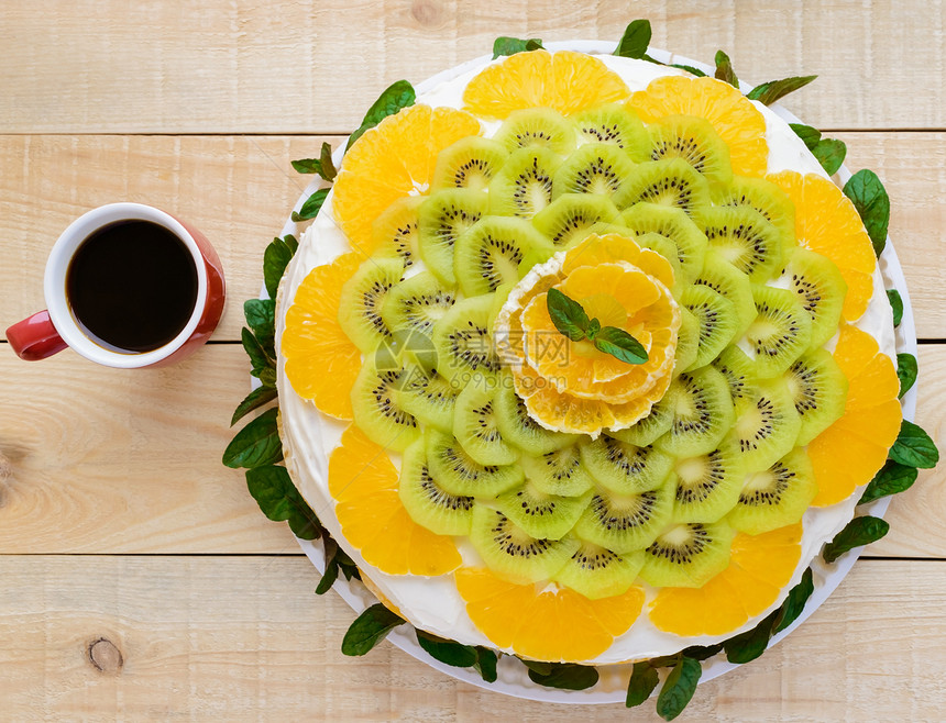 水果蛋糕欧兰果kiwi薄荷加一杯咖啡图片